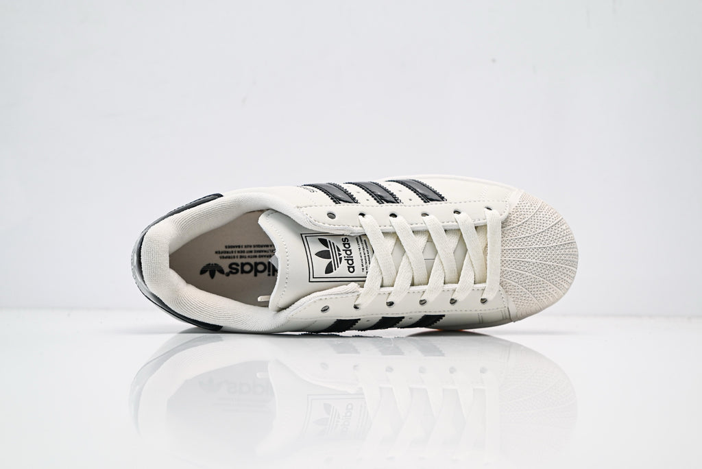 adidas Originals Superstar – Off-White Upper with Black Patent Accents & Gum Sole