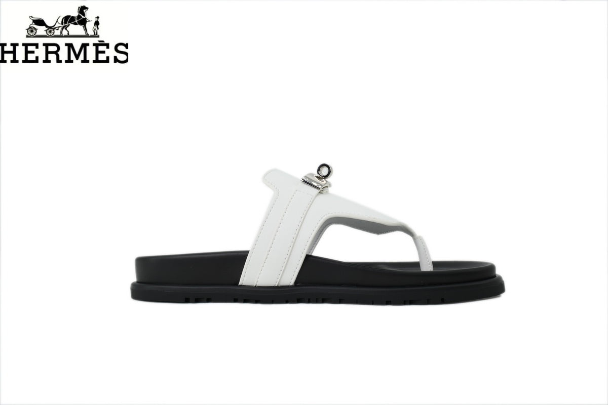 Hermès female slides White Leather Flip-Flop Slide with Metal Buckle