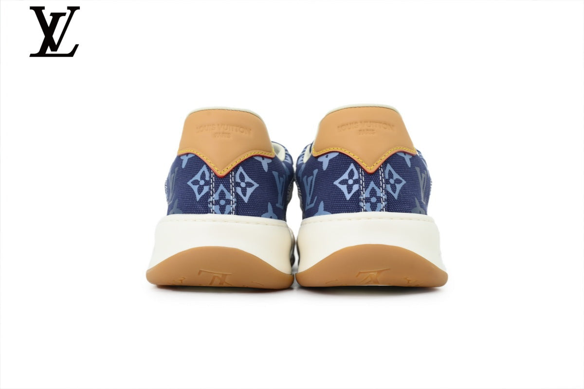Louis Vuitton Low Top Sneaker in Blue Monogram Canvas with White Leather Trim and Gum Sole