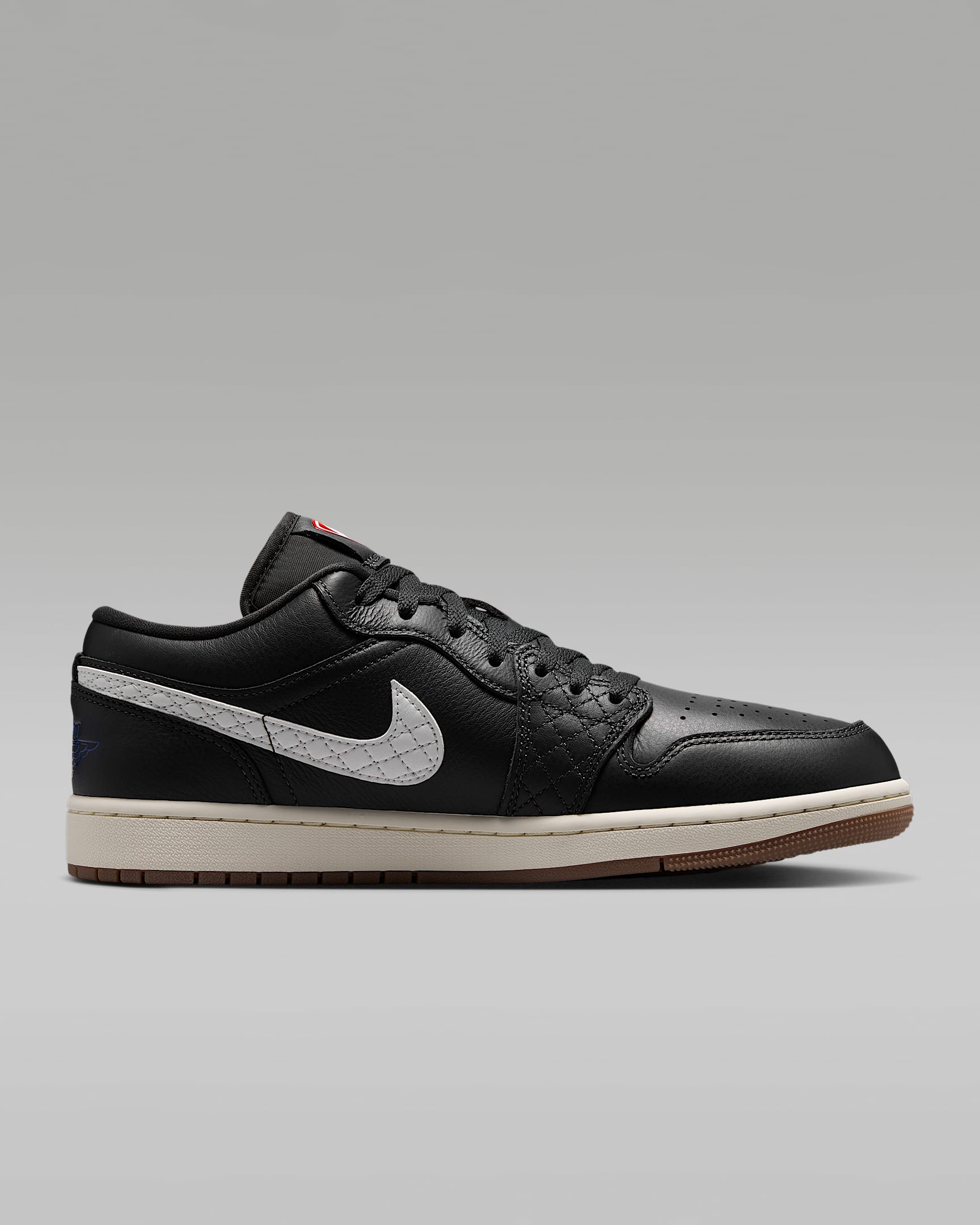 Air Jordan 1 Low Black White Quilted Swoosh Gum Outsole Leather Sneakers