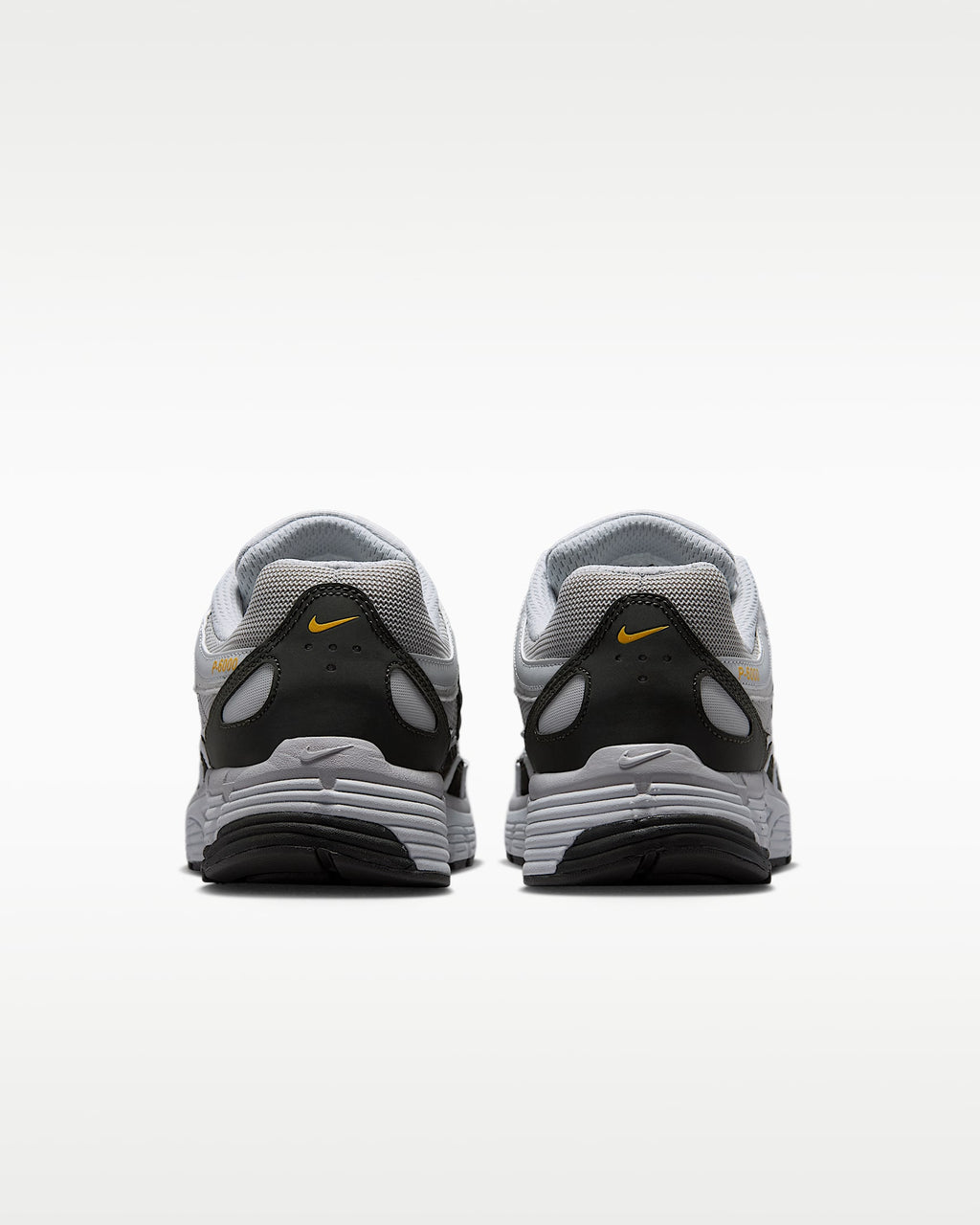Nike P-6000 – Grey / Black / Orange Mesh Athletic Sneakers